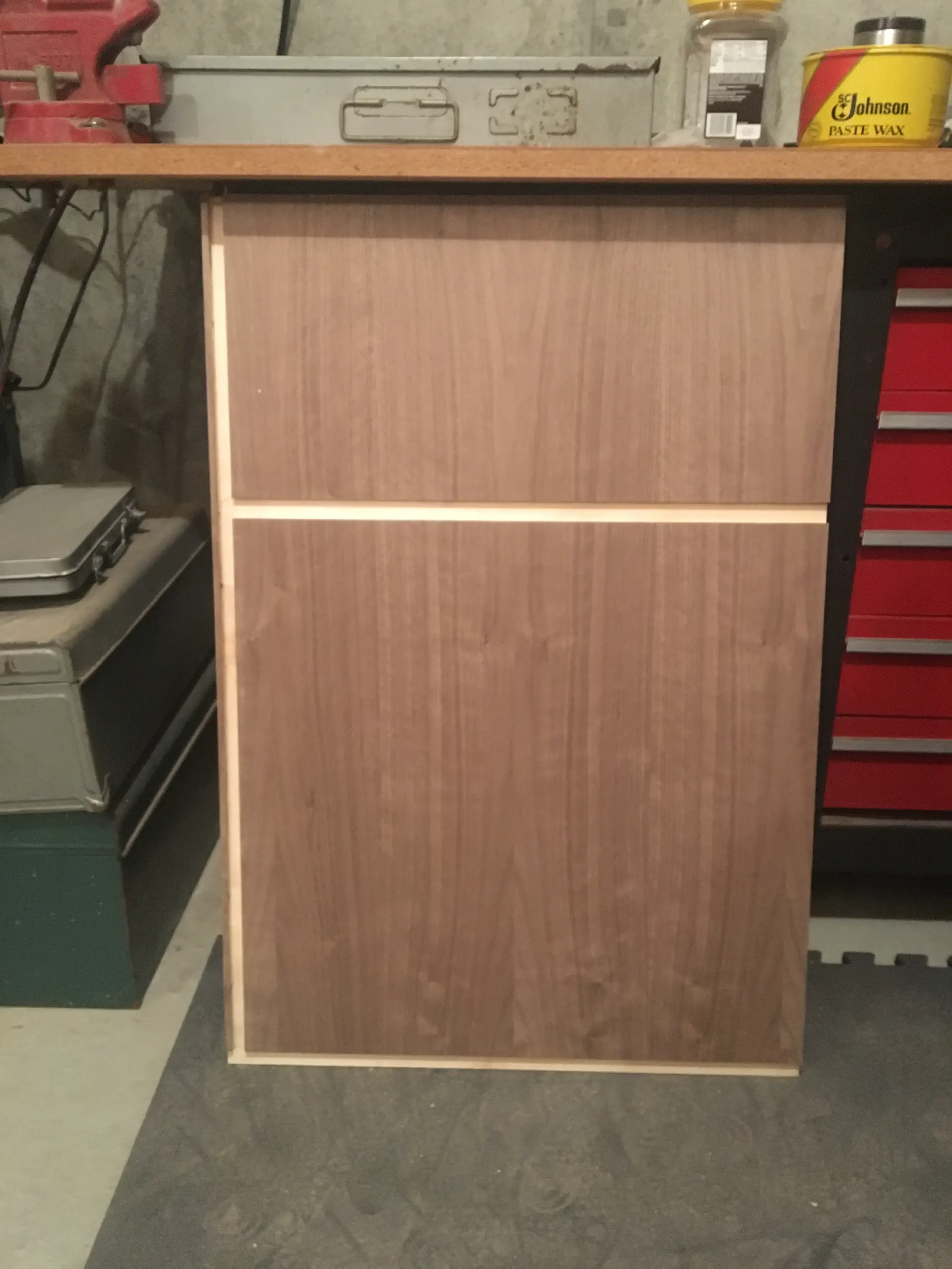 A cut panel with dados, waiting to be assembled