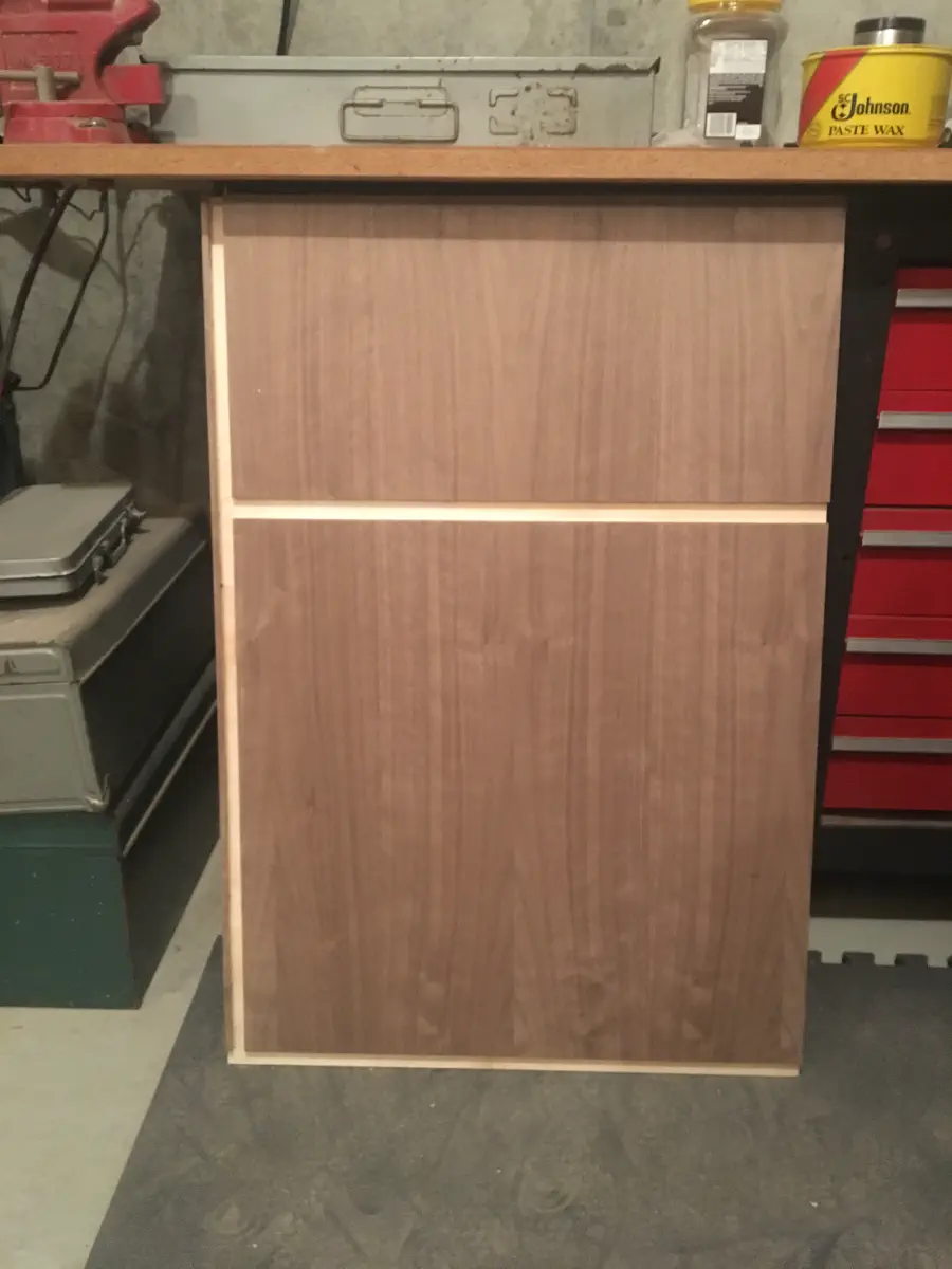 A cut panel with dados, waiting to be assembled