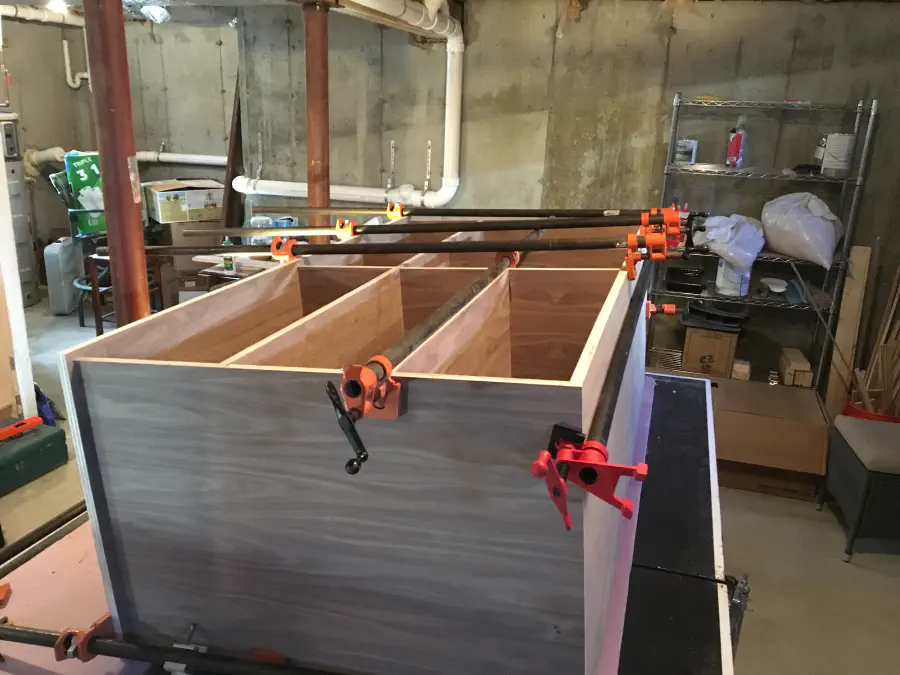 Glued cabinet on it's back, clamped together to ensure a good glue bond overnight