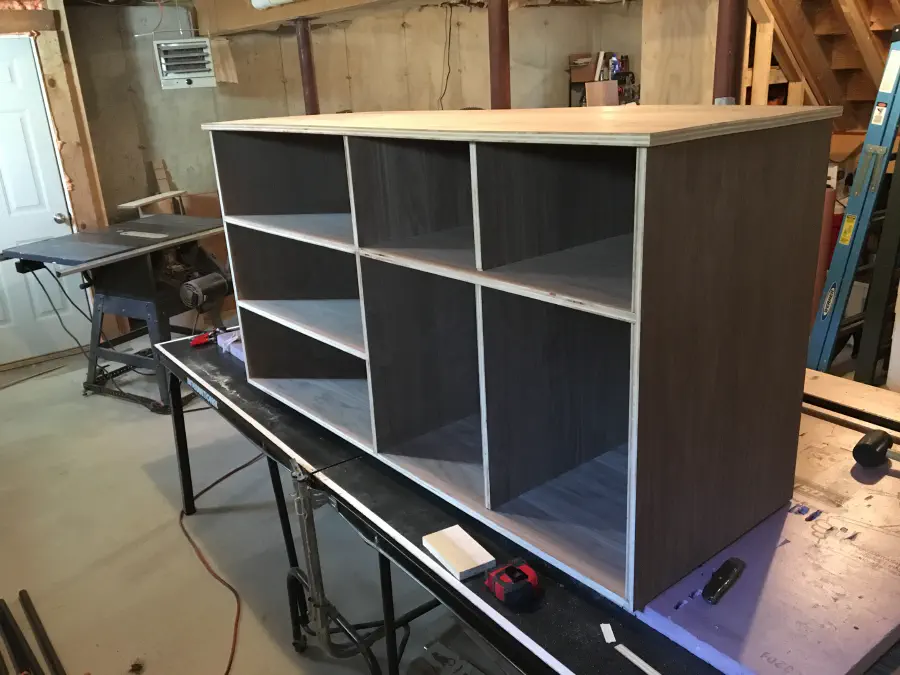 The glued cabinet upright with no clamps on it