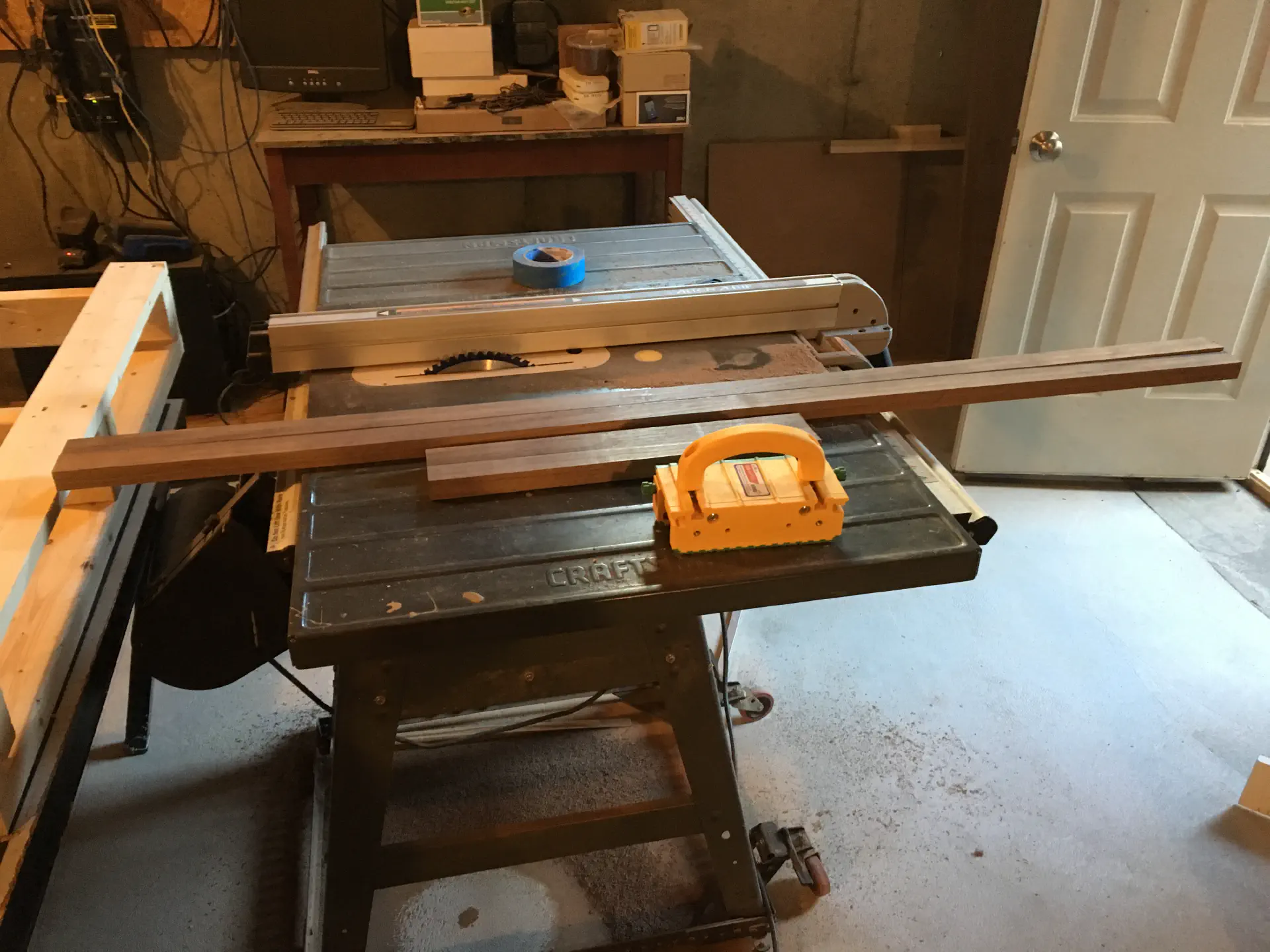 The hardwood board is broken down after jointing into two long and two short rails for the apron base