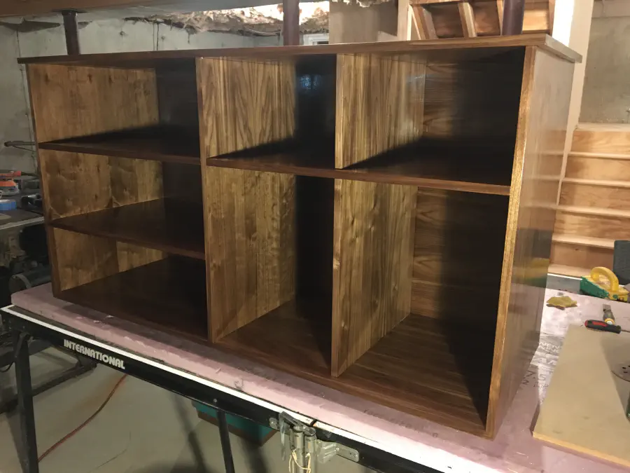 The cabinet has some coats of finish applied