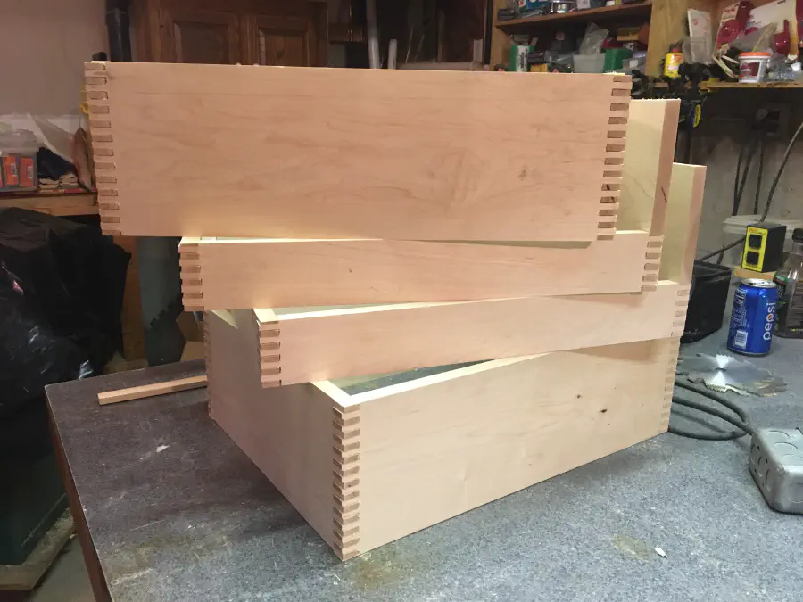 Maple drawers and trays stacked showing box joints