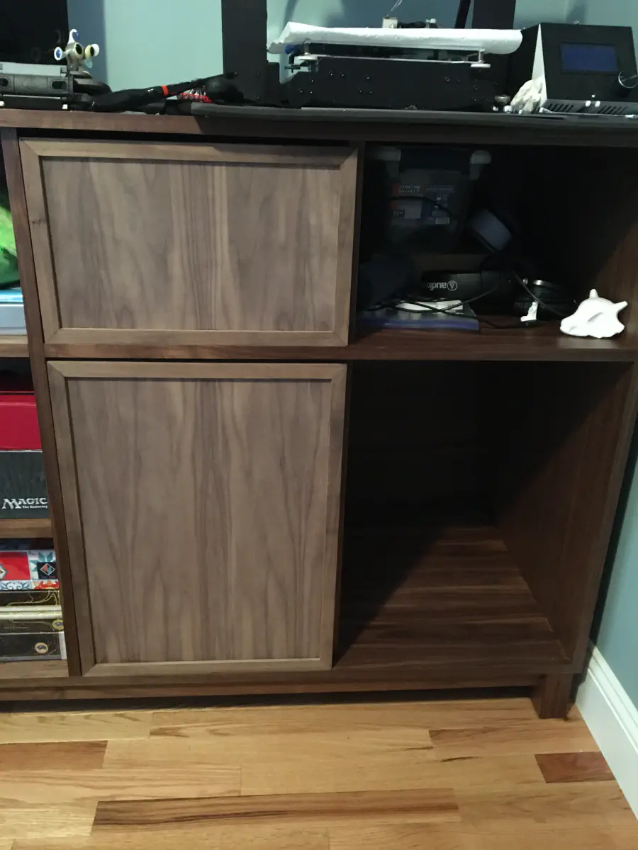 The walnut doors in place but not mounted on the cabinet or drawers