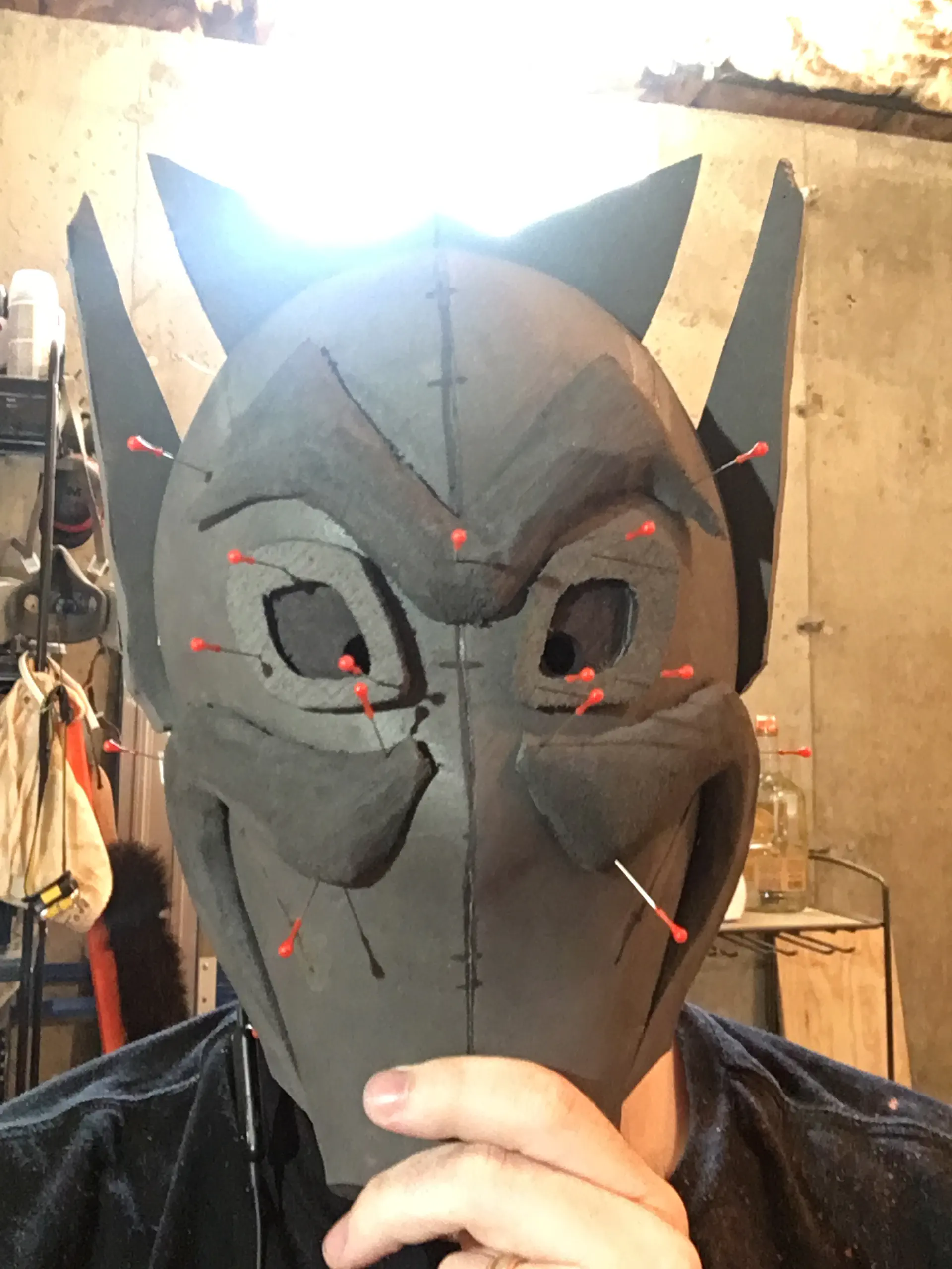 Similar to the eyebrow, the mustache is tapered down to blend into the mask.