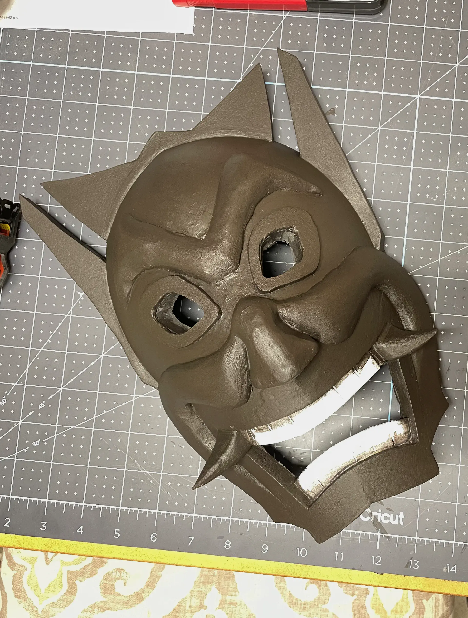 Using Fine Finish, a paint-like finish on top of the foam, I could smooth out the texture and sand it down.