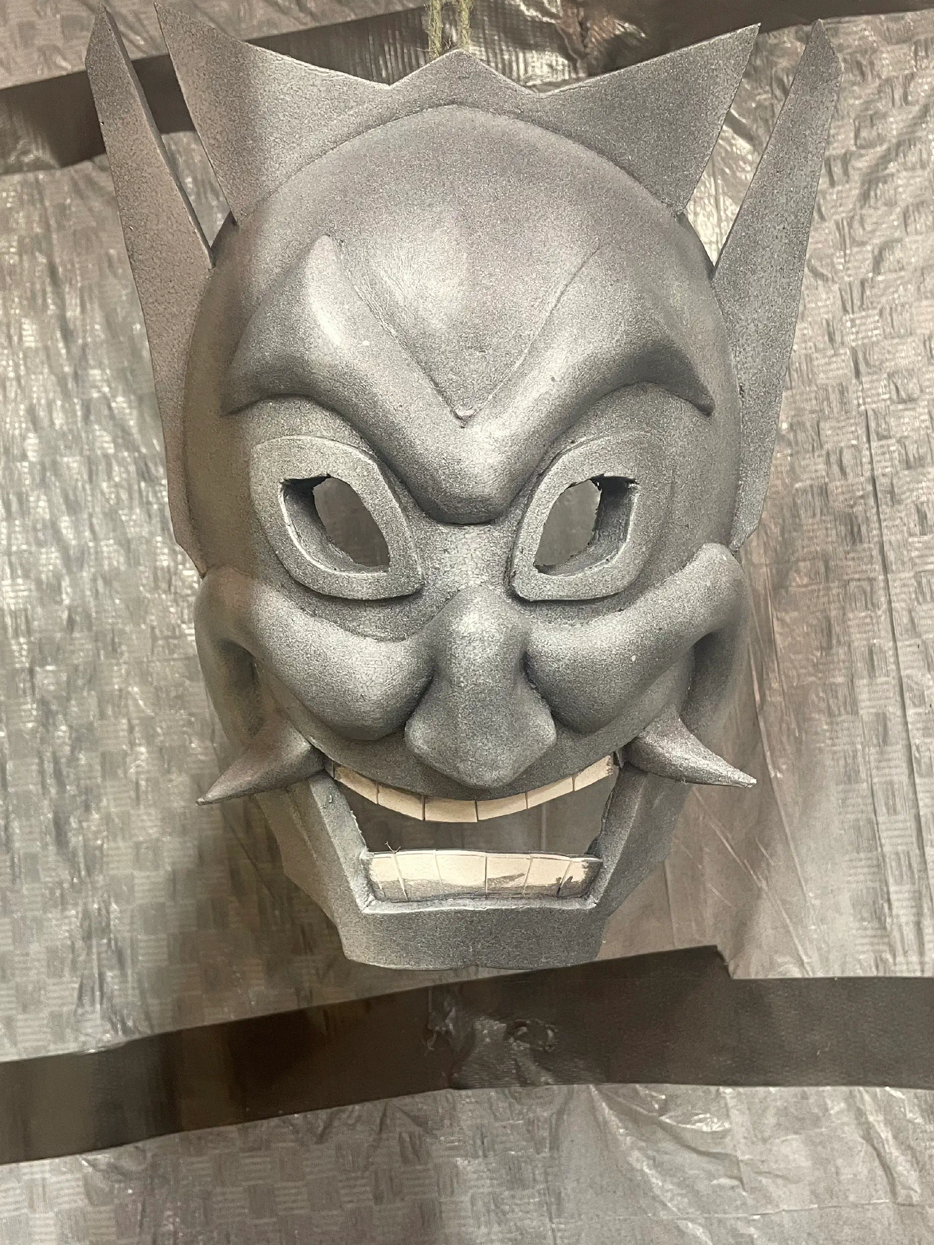 First coat of PlastiDip being sprayed on. A lot of foam color is still showing through.