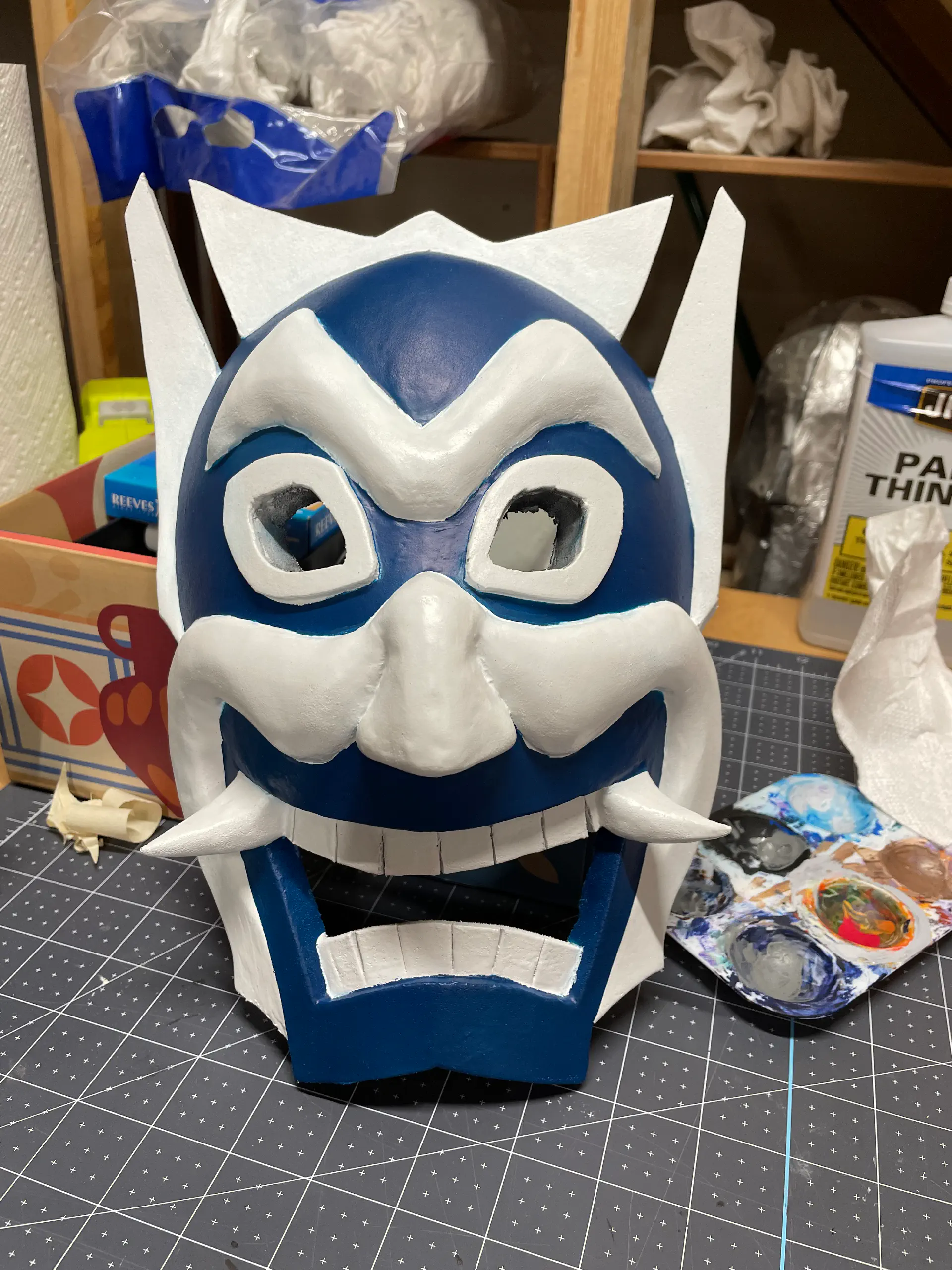 After multiple times back and forth with blue and white paint, the painted mask is finished.